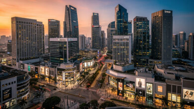 Singapore skyline with Orchard Road retail and prime office towers at dusk