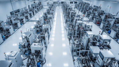 Advanced semiconductor fabrication facility interior with precision manufacturing equipment under blue-white lighting