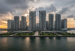 Forest City skyline at dusk, Johor, Malaysia, modern towers on reclaimed islands