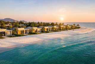 Luxury beachfront villa resort, Nha Trang Bay, Vietnam, golden hour lighting