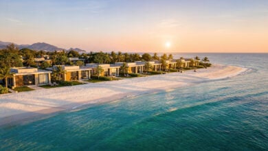 Luxury beachfront villa resort, Nha Trang Bay, Vietnam, golden hour lighting