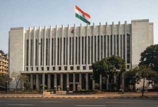 Reserve Bank of India headquarters in Mumbai with Indian flag