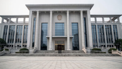 Shenzhen Intermediate People's Court building exterior, formal judicial architecture, overcast light